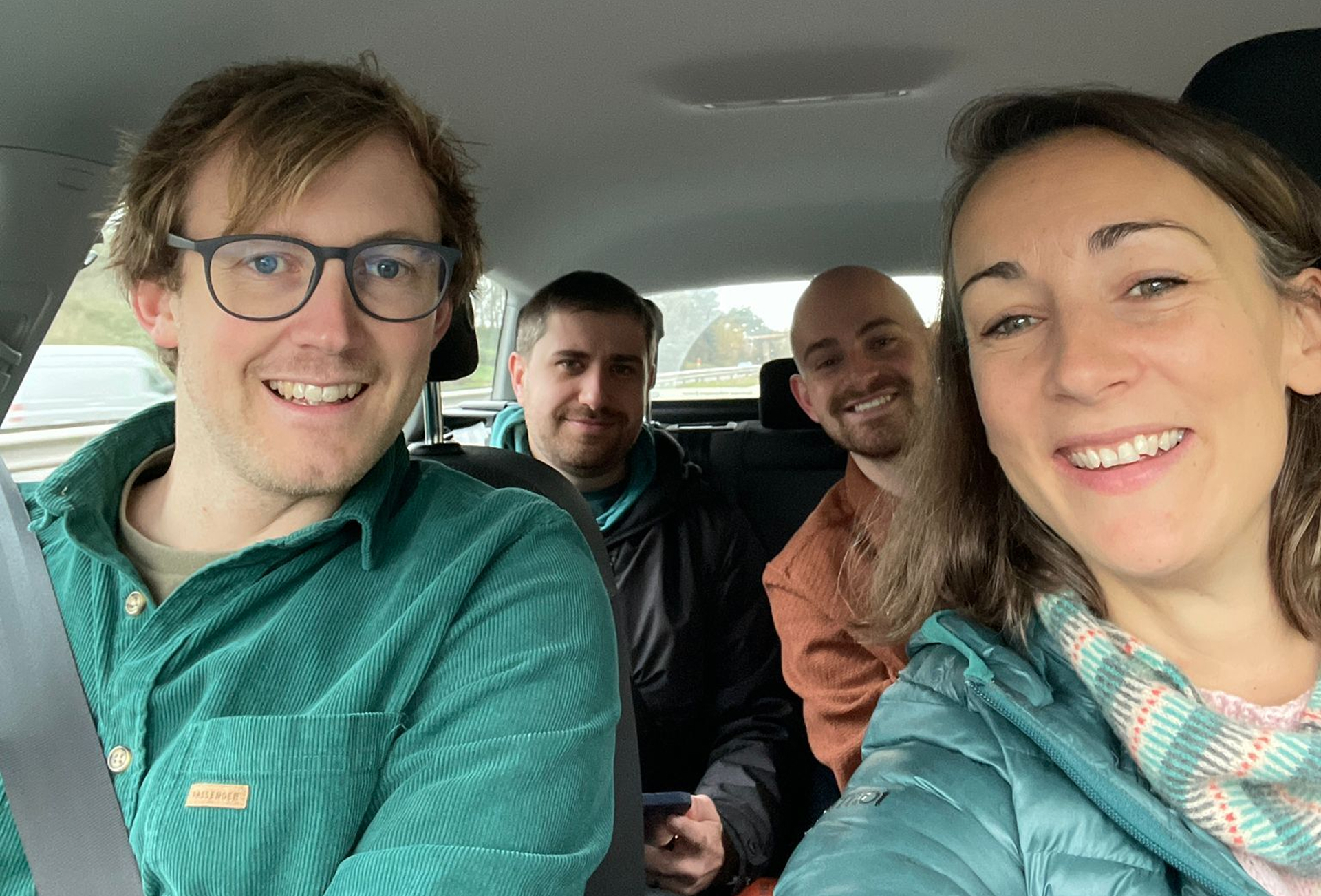 Nick, Laura, Alex and Charles in a car