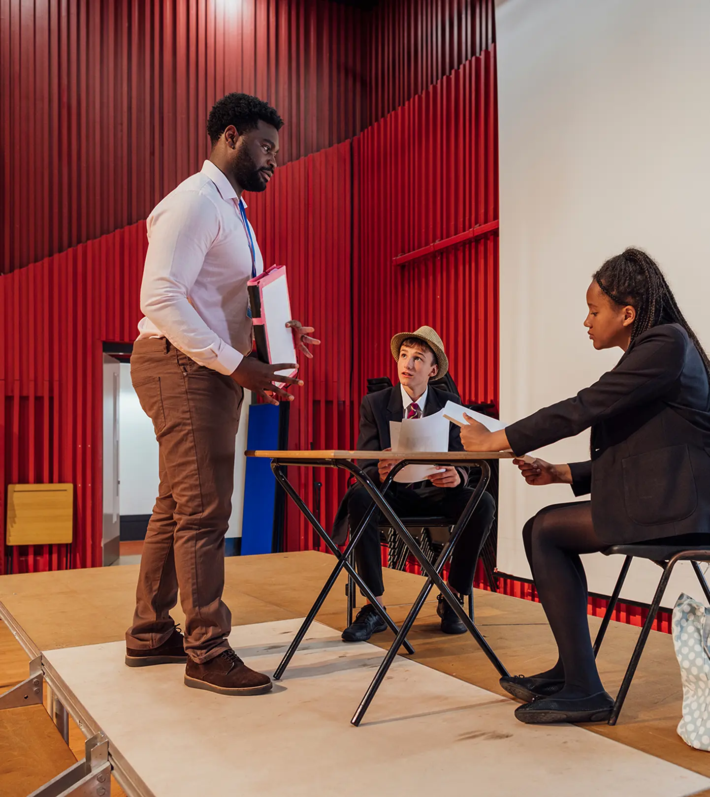 Image of students on a stage